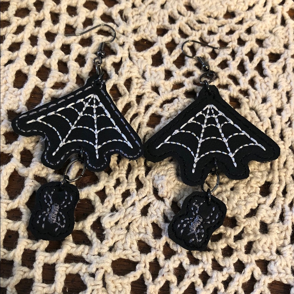 Black Spider Web Dangle Earrings with White Stitch Detailing